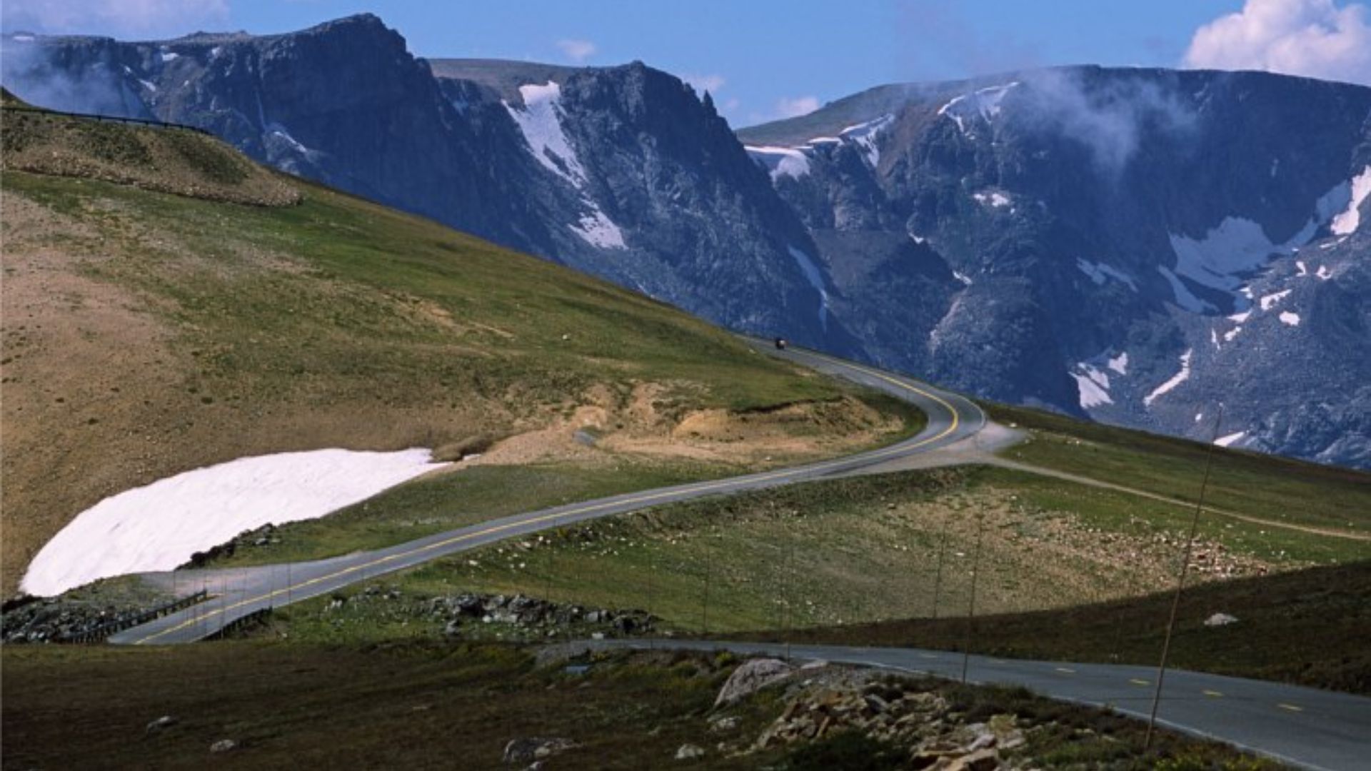 Approaching Beartooth Pass [10,947 ft (3,337 m) high] from the west along the Beartooth Highway, which crosses the Beartooth Mountains.

The Beartooth Mountains are a sub-mountain range of the Rocky Mountains System.