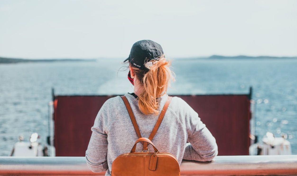 Woman on a Ship Cruise Looking at the View
