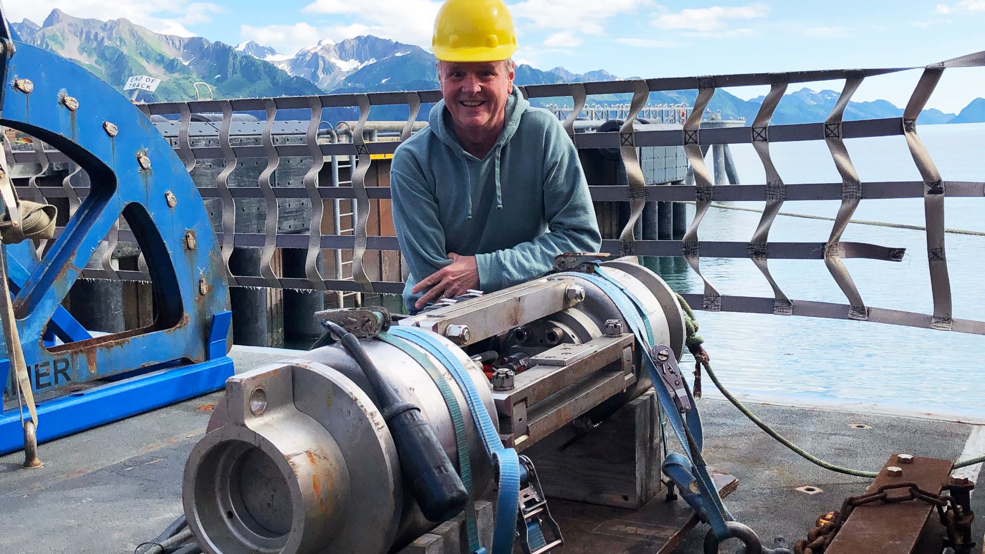 Seismologist with 18 liter air gun array, secured for Arctic transport aboard the R/V Sikuliaq.