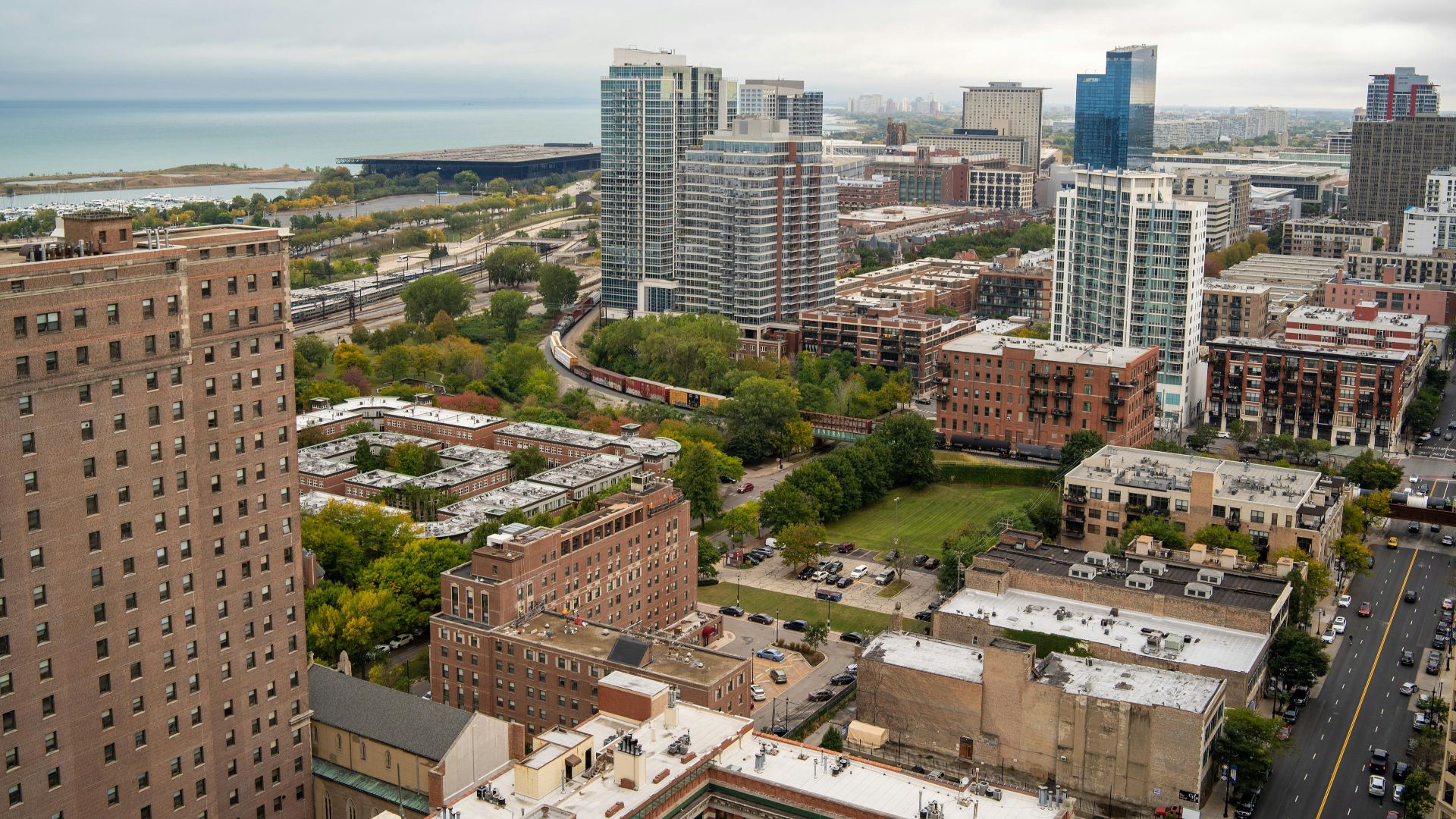 Captivating aerial view showcasing downtown Chicago's skyline with Lake Michigan in the background.