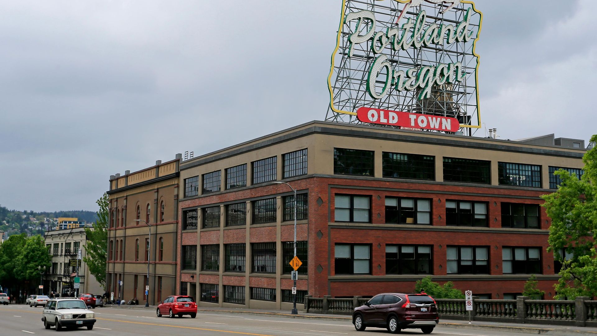 Famous Portland Oregon Old Town sign, capturing urban architecture and city vibe.