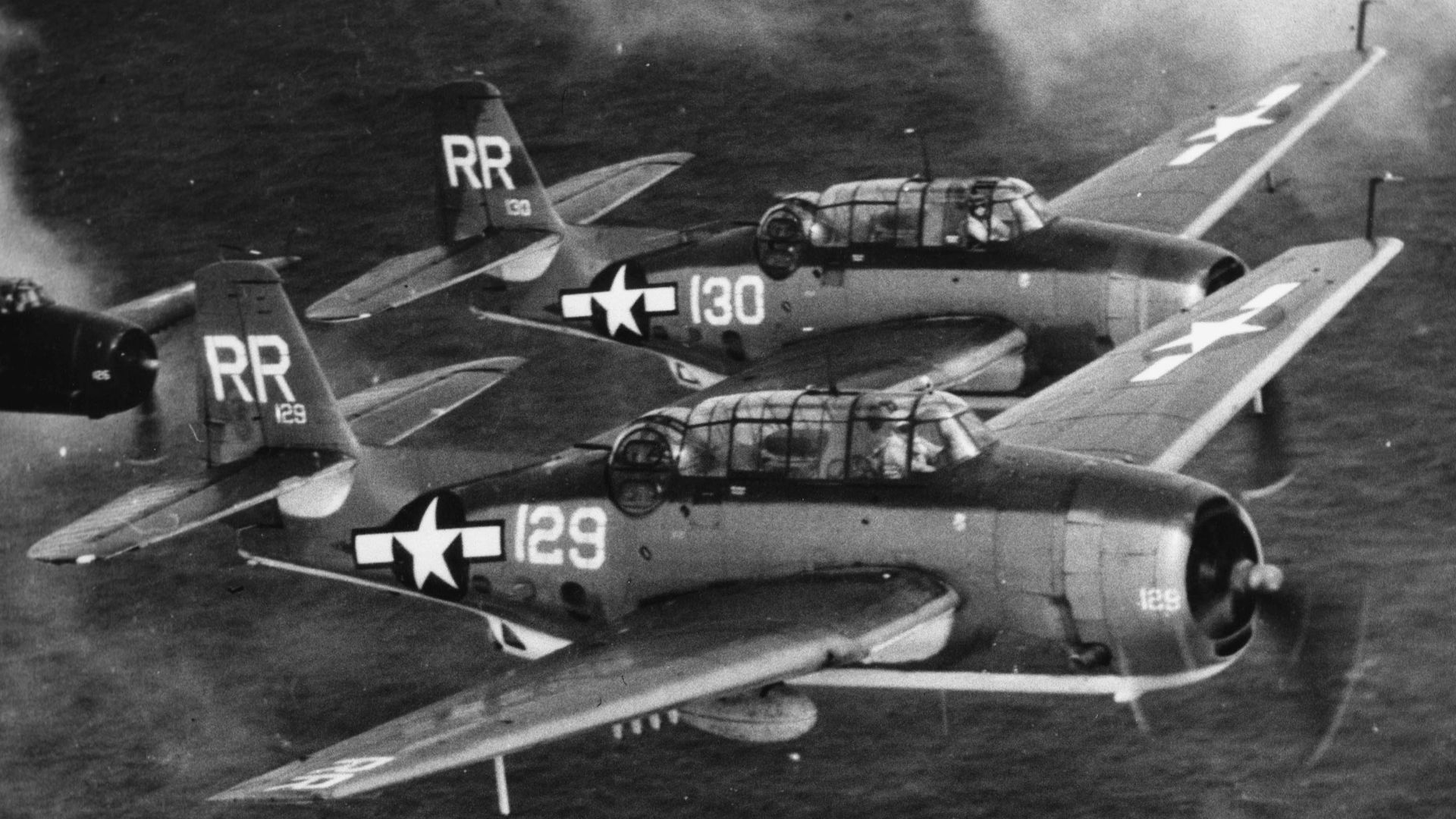 Three U.S. Navy Grumman TBM-3 Avengers from Torpedo Squadron 88 (VT-88) flying in formation on 22 August 1945. VT-88 was assigned to Carrier Air Group 88 (CVG-88) aboard the aircraft carrier USS Yorktown (CV-10). Note that the aircraft wear the new tail code
