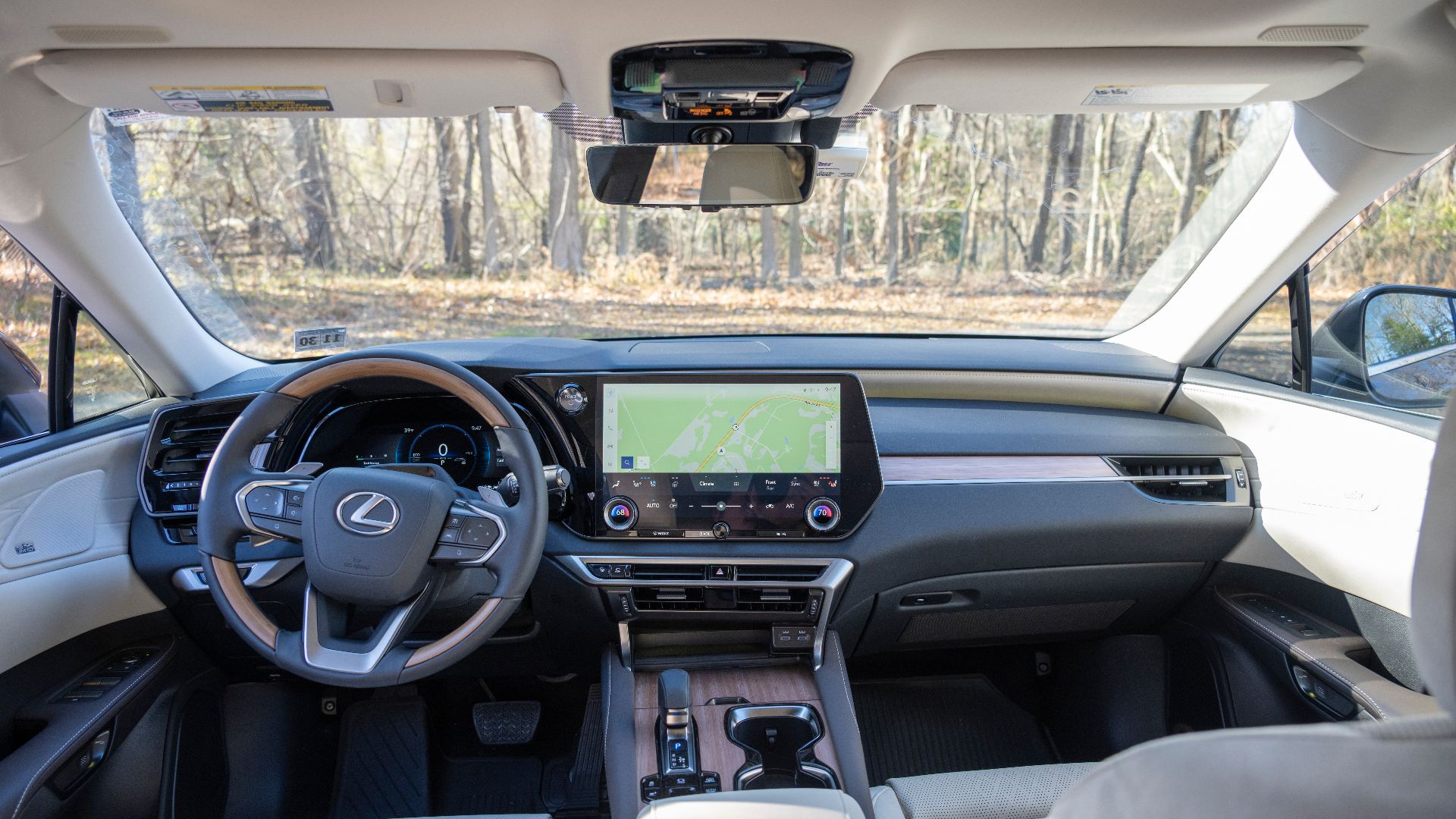 A 2026 Lexus RX 450h+ Luxury trim with a Macadamia semi-aniline leather and Ash Bamboo trim interior