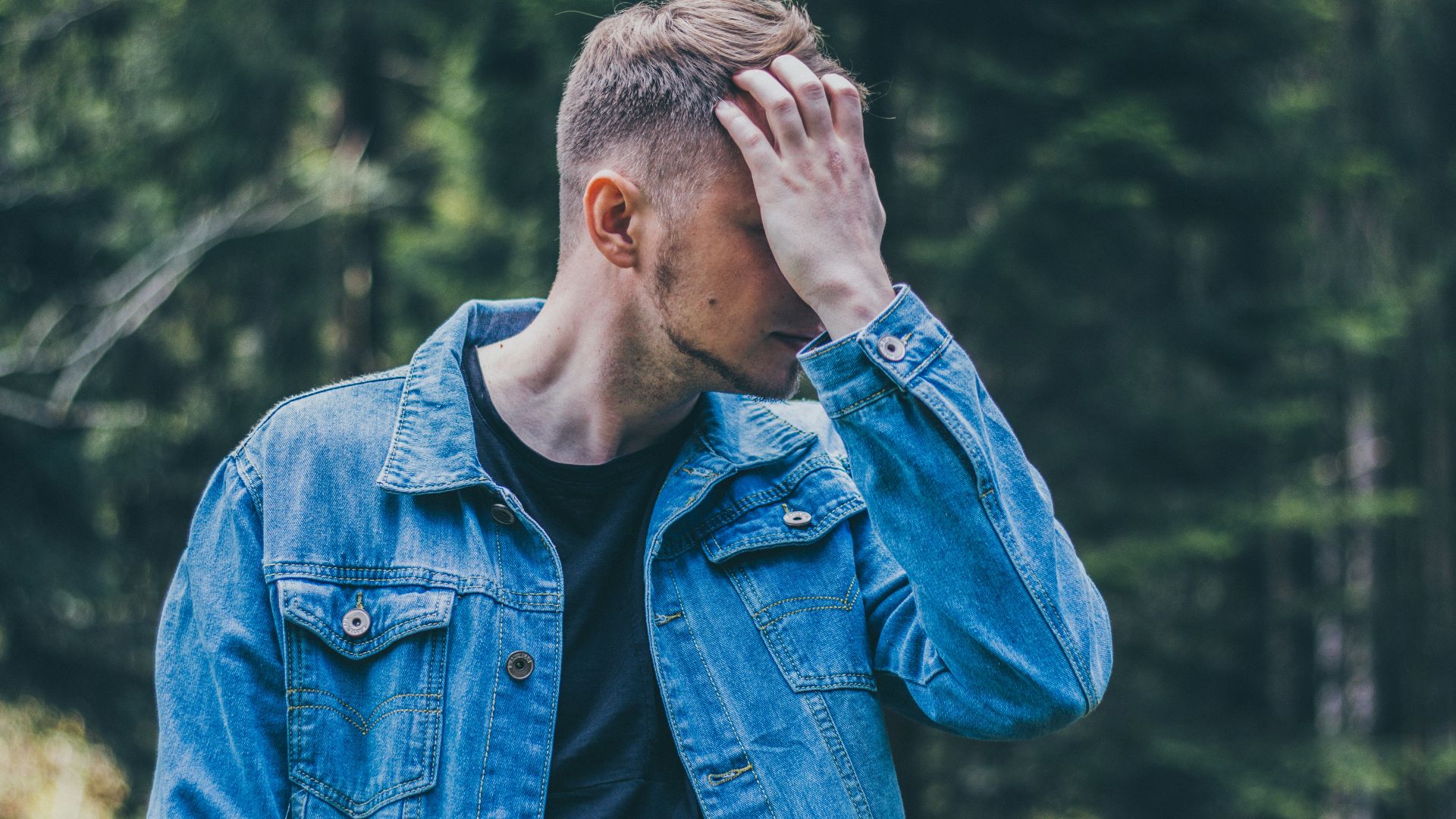man in blue denim jacket