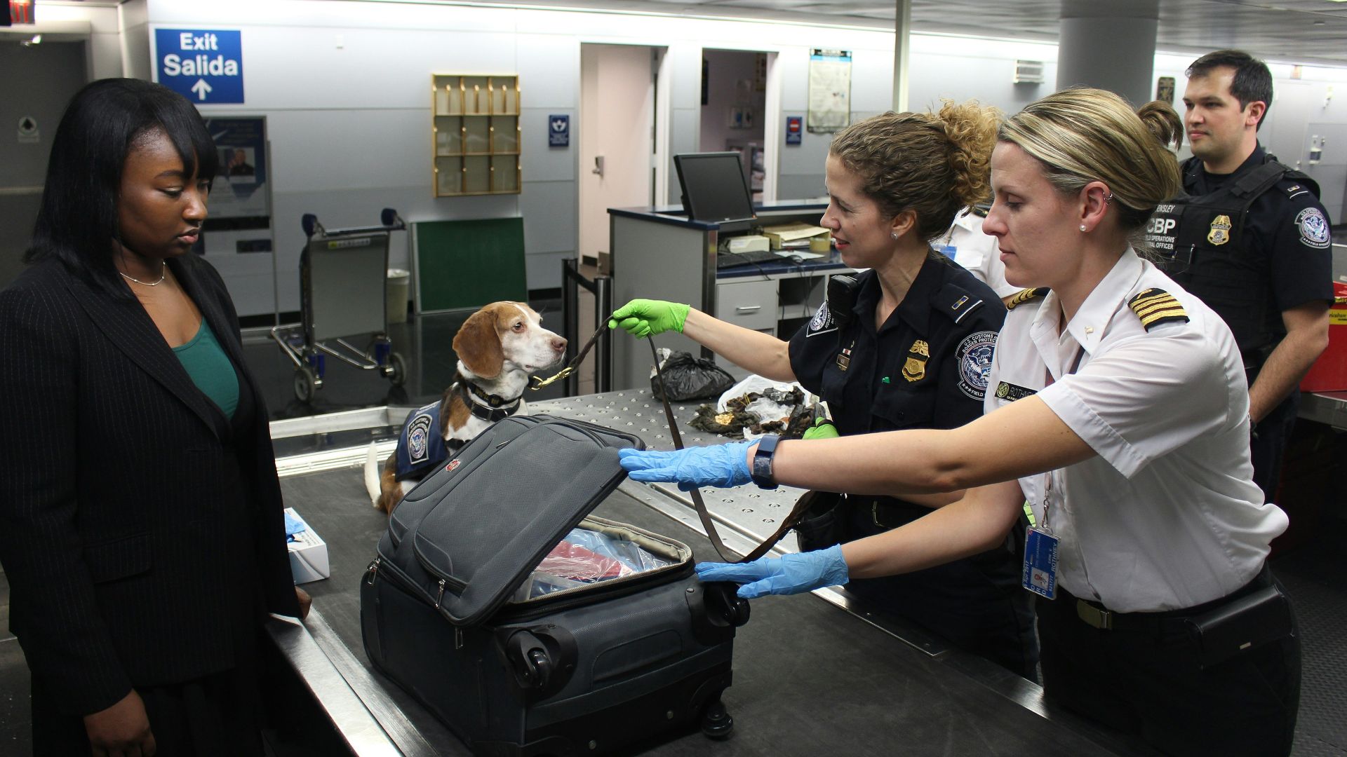woman in black crew neck t-shirt standing beside woman in white t-shirt