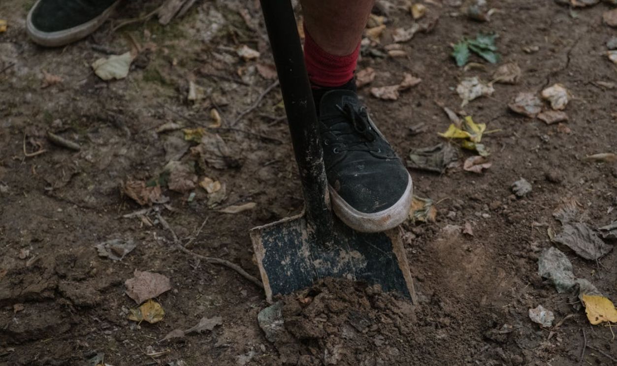 A Person Using a Shovel