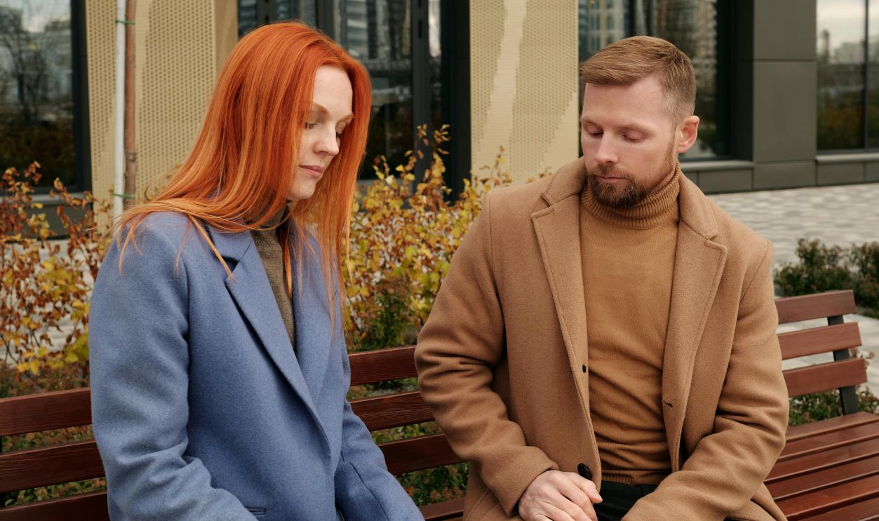 Man and Woman Sitting on the Bench