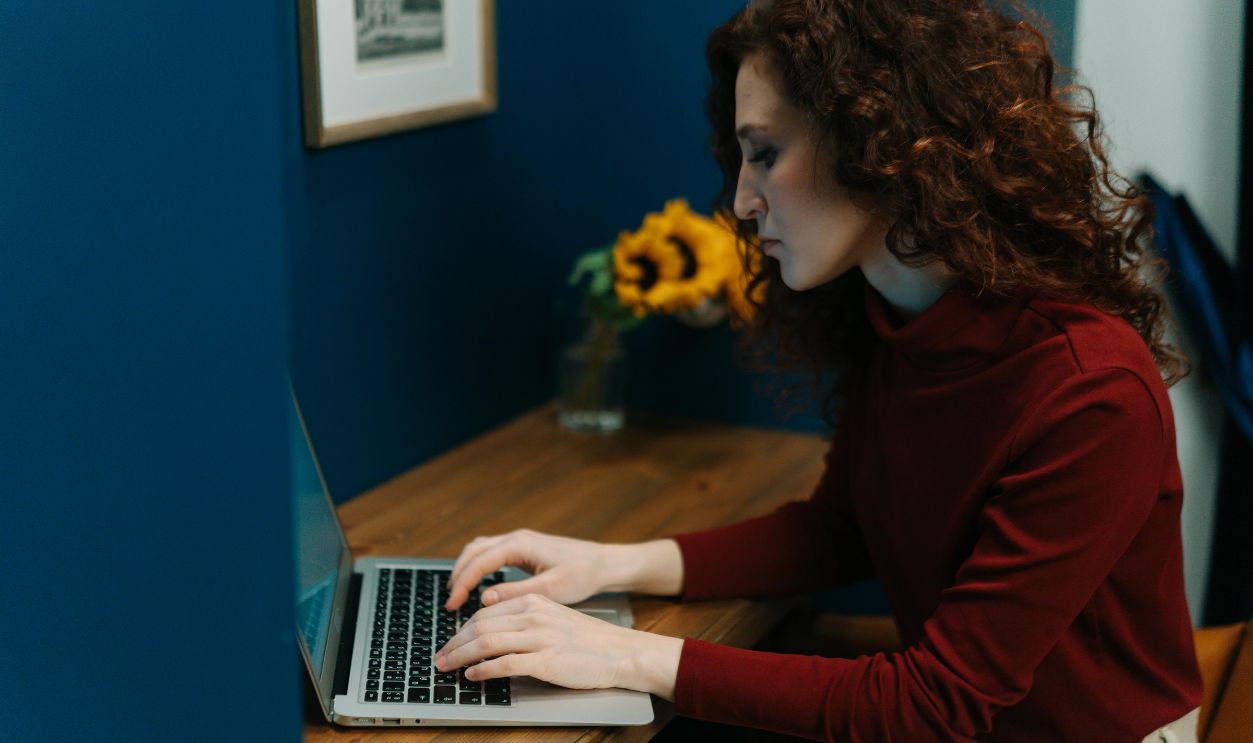 A Woman Using a Laptop