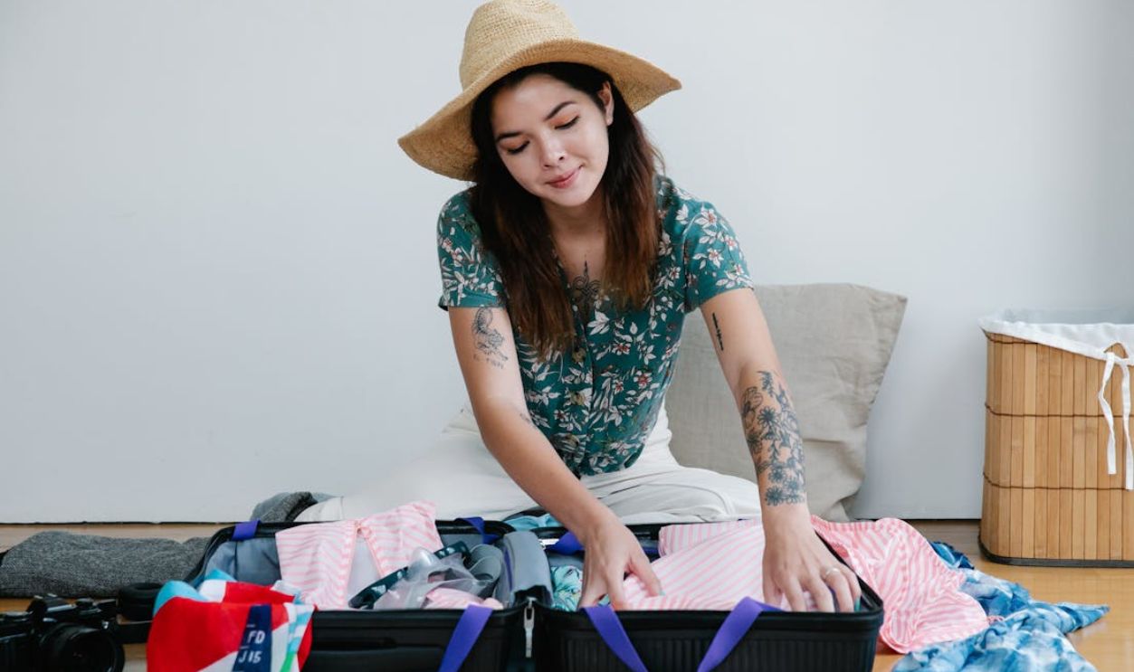 Woman Packing for Vacation
