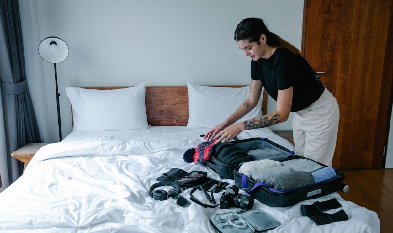A Woman Packing Up Her Things