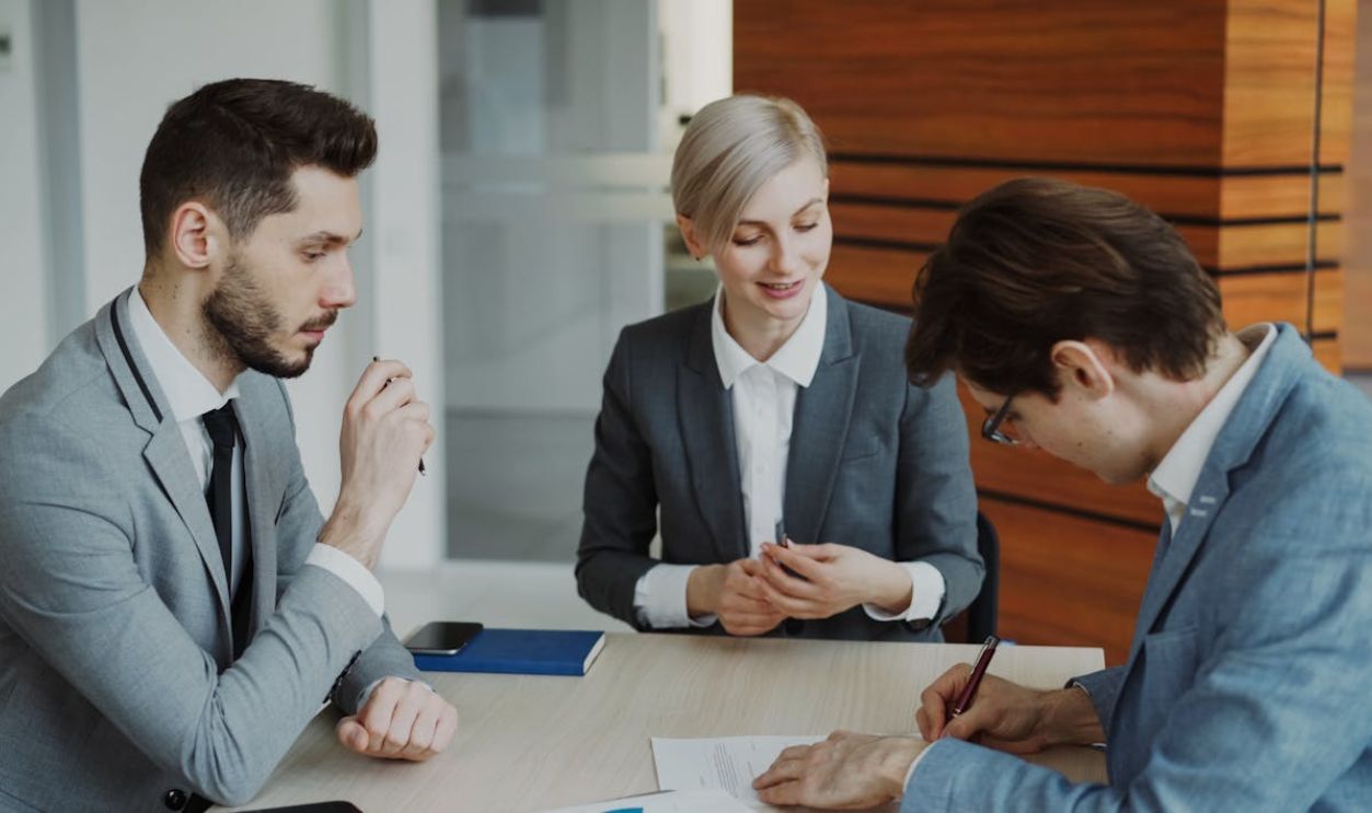 Business Team in a Meeting at Office Table