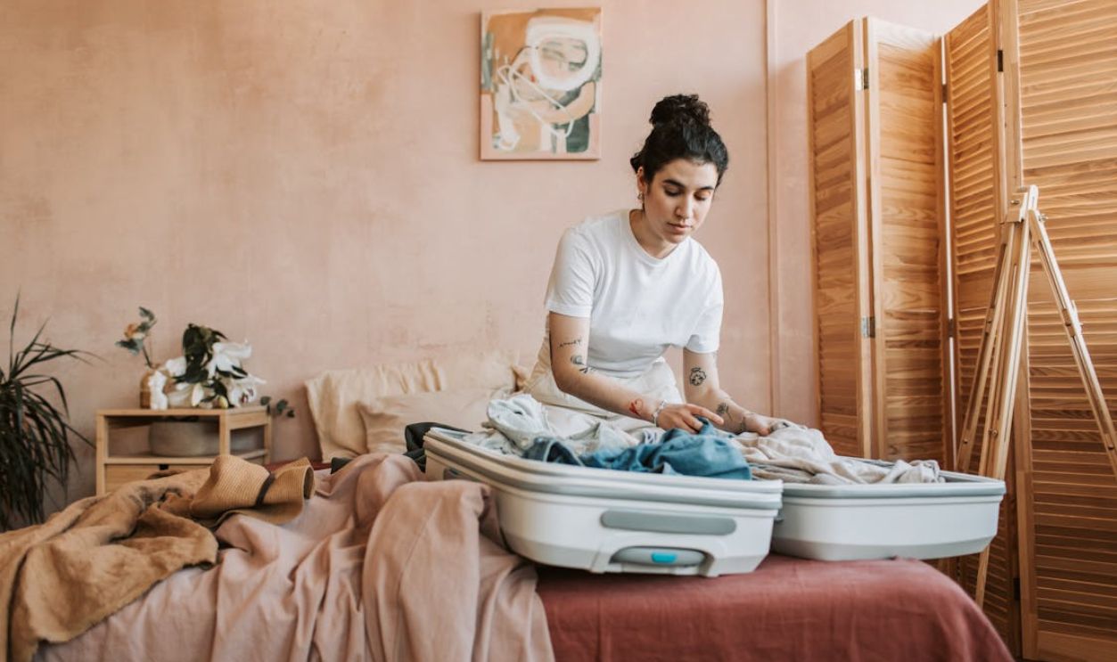 Pretty Woman Packing Her Clothes