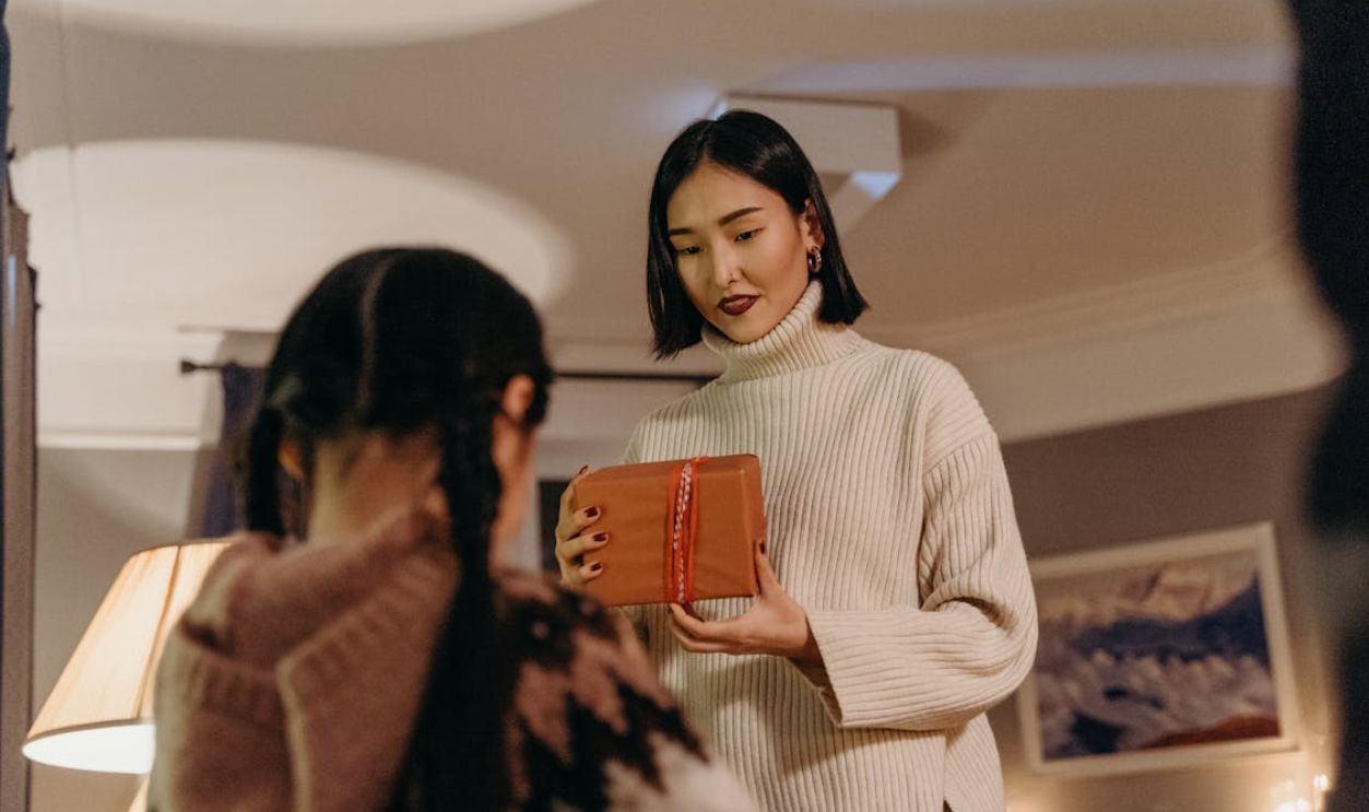 A Mother Giving a Gift to her Daughter