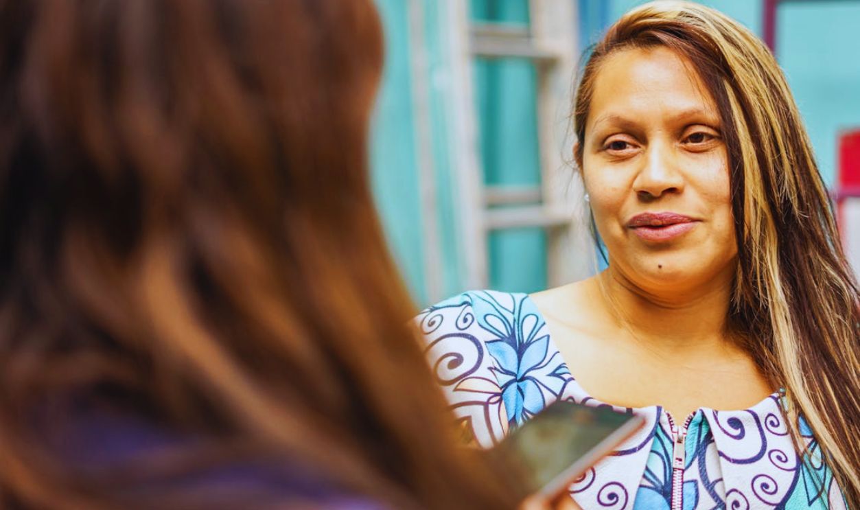 Woman with Long Hair Speaking