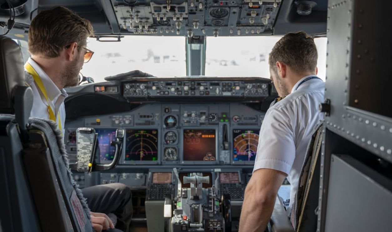 Two Pilots Sitting Inside Plane