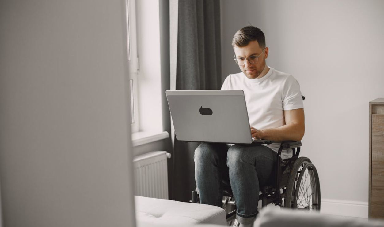 A Man Using a Laptop