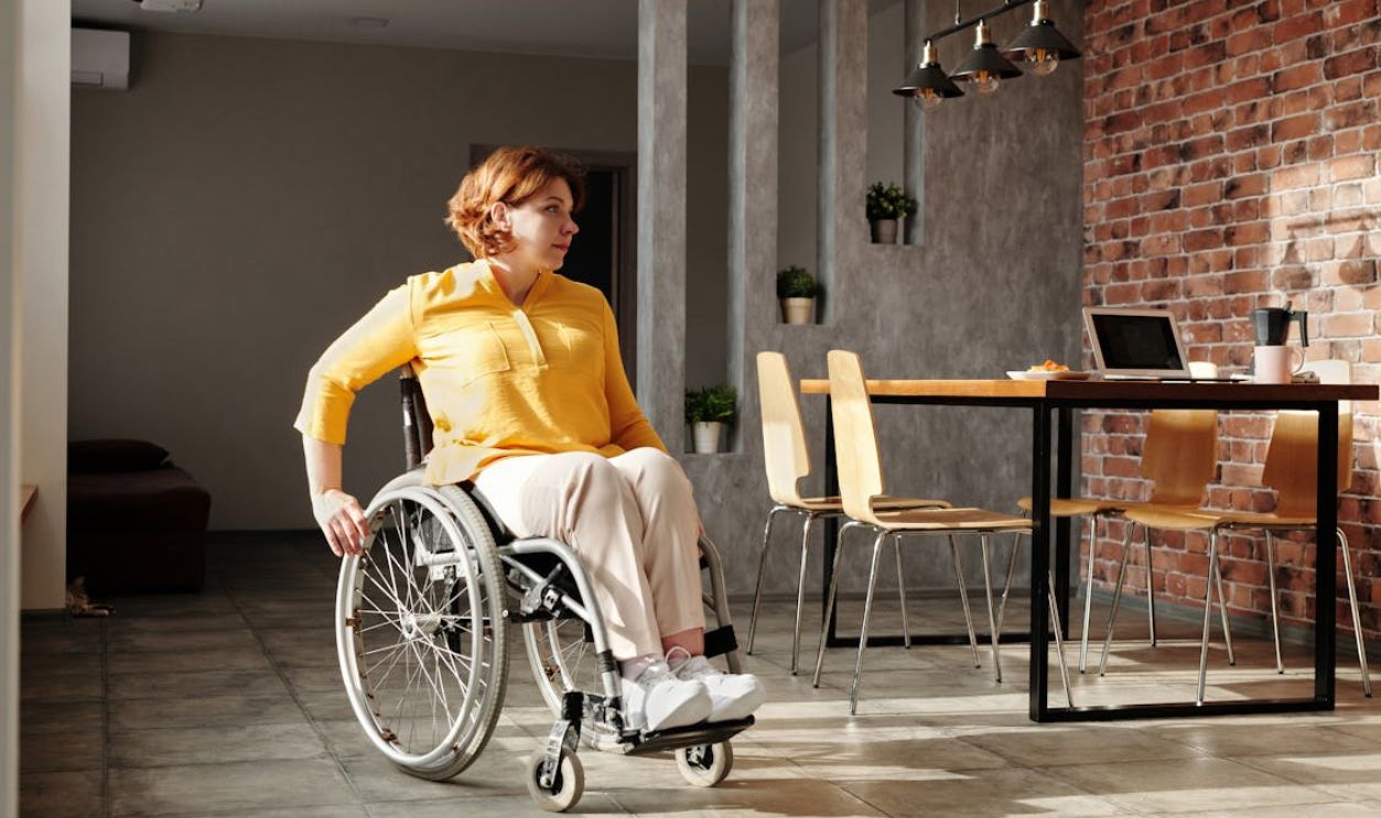 Woman Sitting in Wheelchair