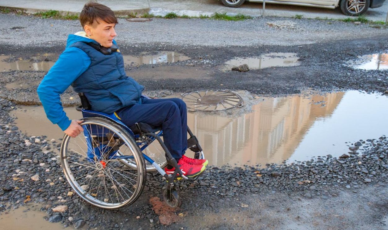 Woman on Wheelchair on Street