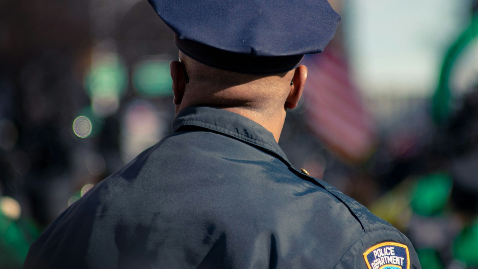 man wearing police uniform selective focus photo