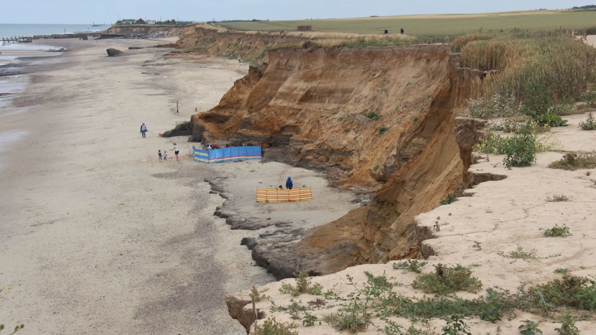 Coastal erosion to the cliffs on the beach in the village of Happisburgh, Norfolk