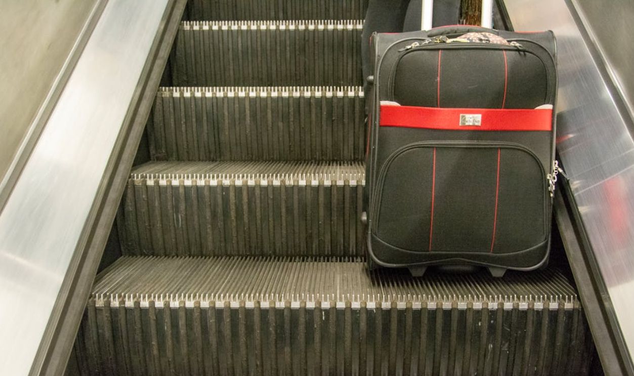 Suitcase on Escalator