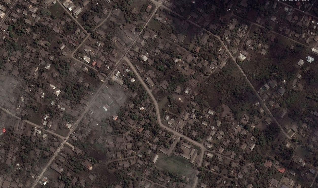 Maxar closeup satellite imagery shows the ash covered homes and buildings on January 18, 2022, after the Hunga Tonga-Hunga Ha'apai volcano eruption on January 14th , 2022 in Tongatapu, Tonga.