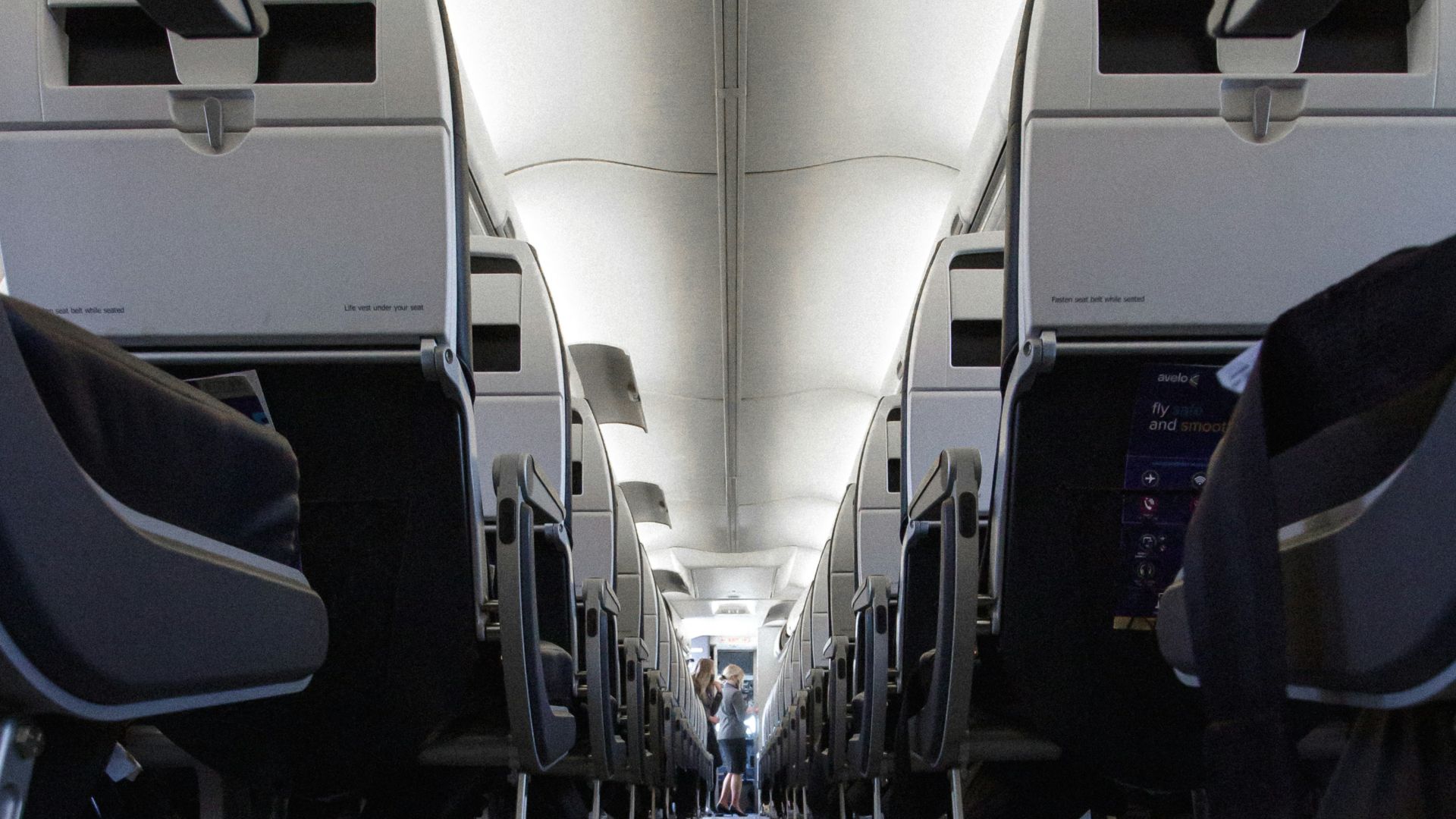 a row of empty seats on an airplane