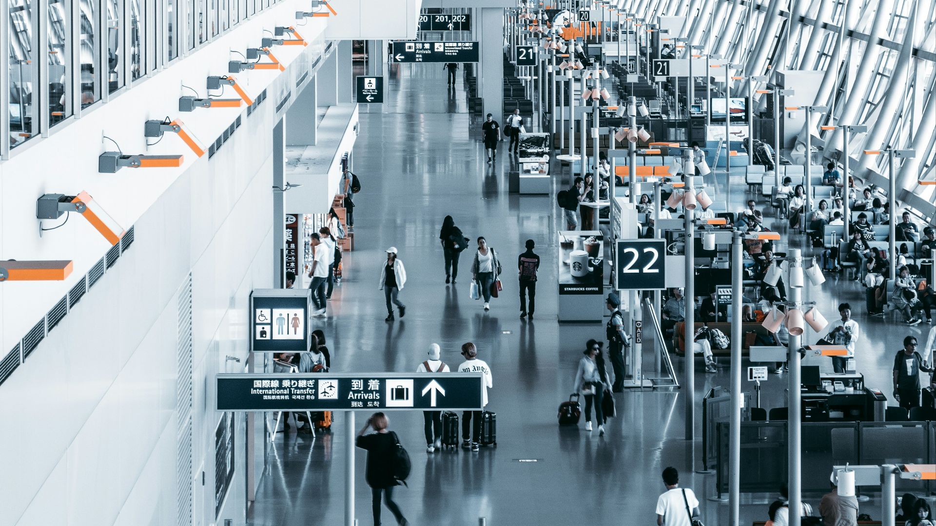 people walking inside airport station