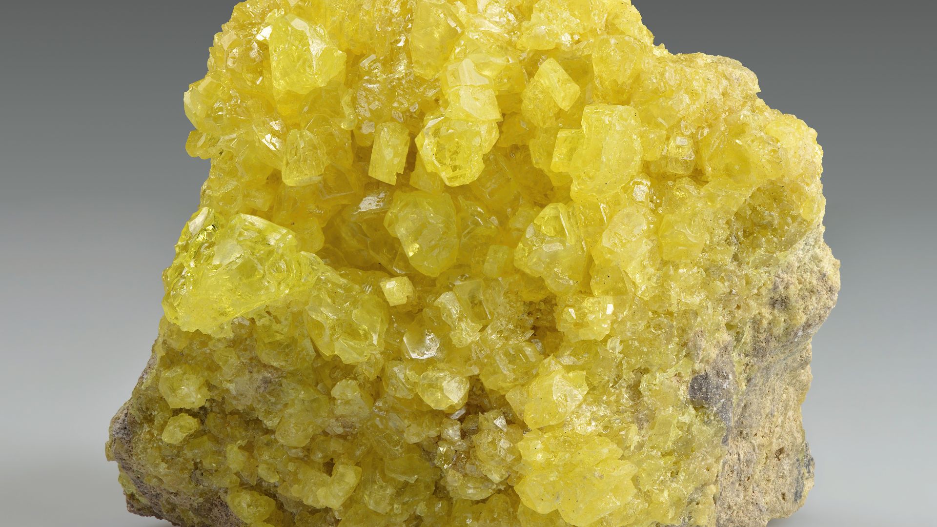 Sulfur crystals on the matrix (4.8 × 3.5 × 3 cm). Found from El Desierto mine, San Pablo de Napa, Daniel Campos Province, Potosí, Bolivia
