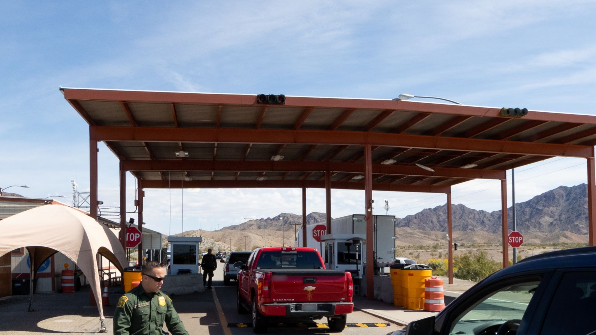 On March 6, 2019, A Yuma Sector Border Patrol Agent, along with his canine partner, conducts operations at the Interstate 8 Checkpoint near Yuma, AZ. U.S. Customs and Border Protection photo by Jerry Glaser