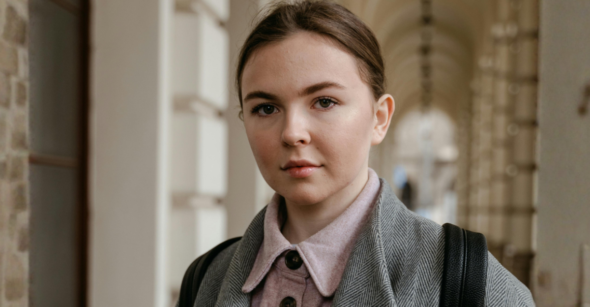 a-woman-holding-books