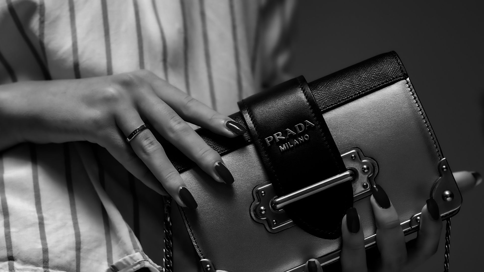 black nikon dslr camera on white textile