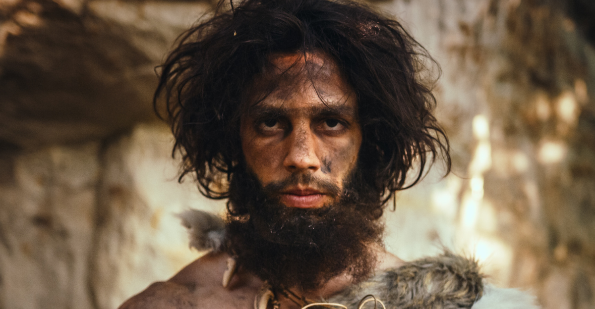 Portrait of Primeval Caveman Wearing Animal Skin Holding Stone Tipped Hammer