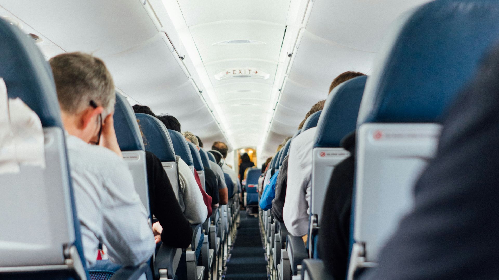 people sitting inside plane