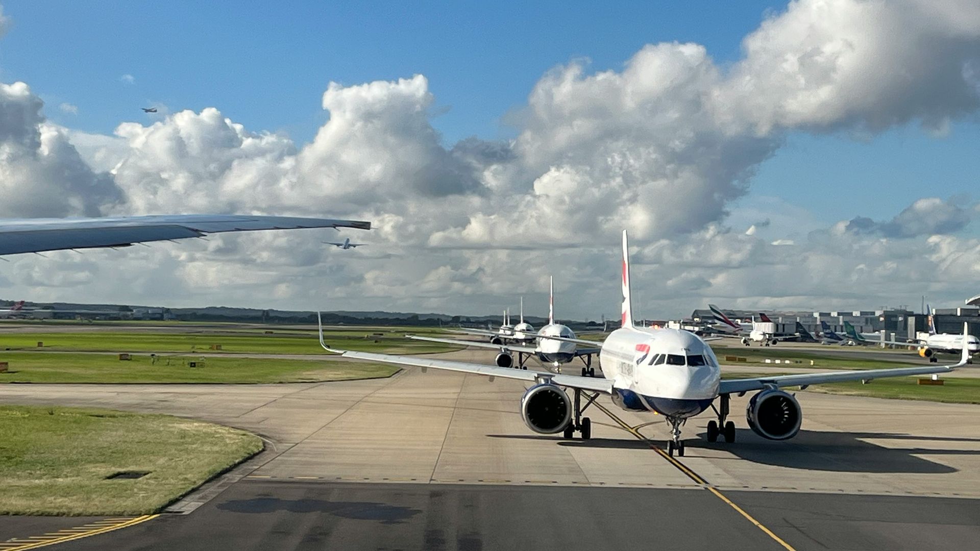 a large jetliner sitting on top of an airport runway
