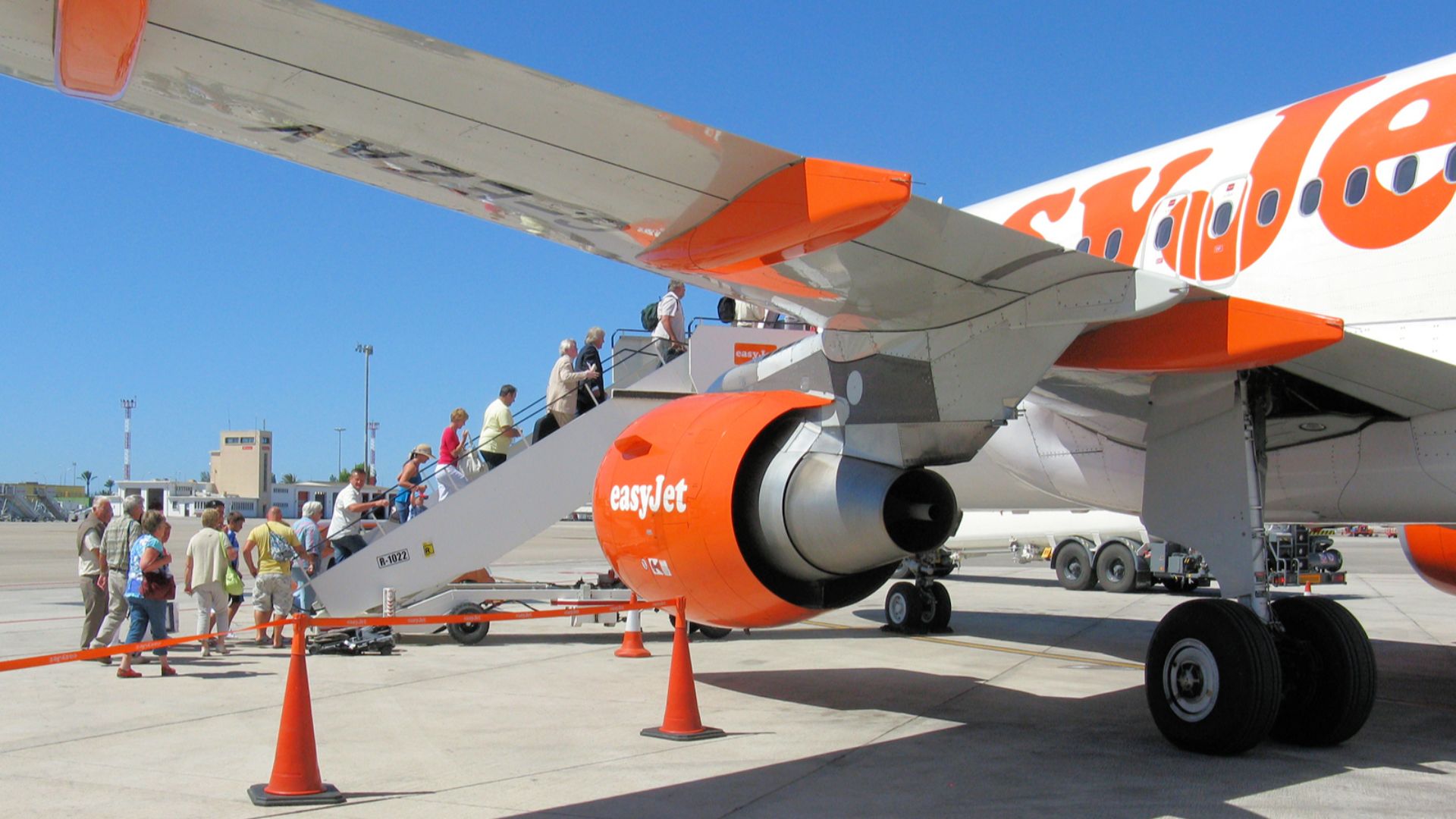 Boarding Easyjet A319-100 (G-EZAV) at Palma Airport, Majorca, for the flight to Bristol, England.