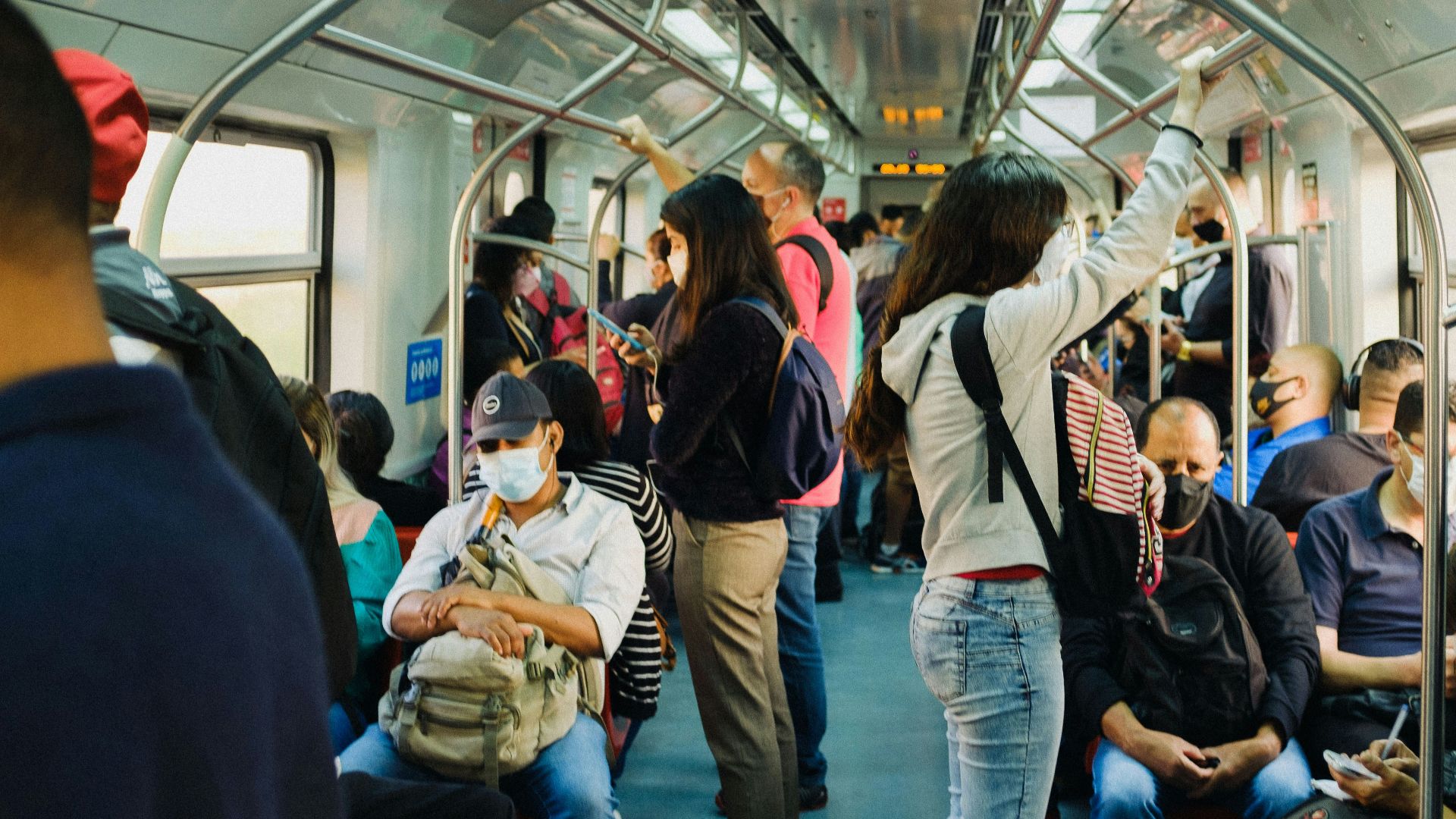people in train during daytime