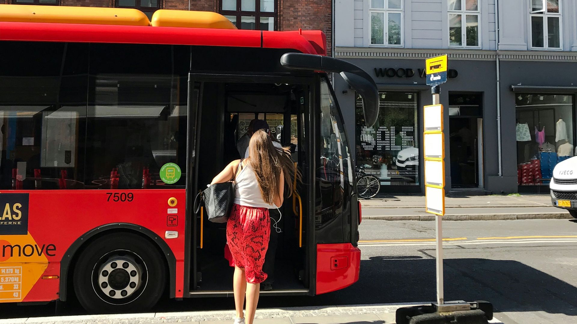 woman going in bus