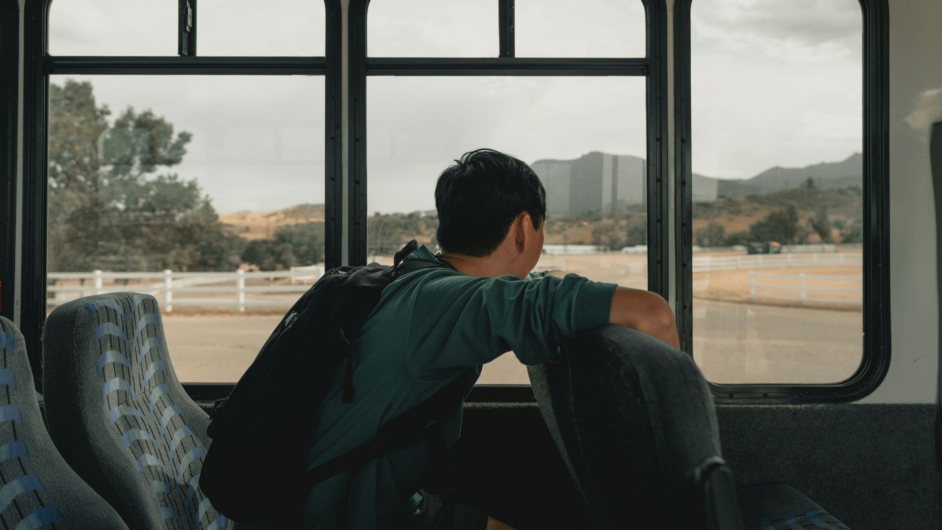 man sitting inside vehicle