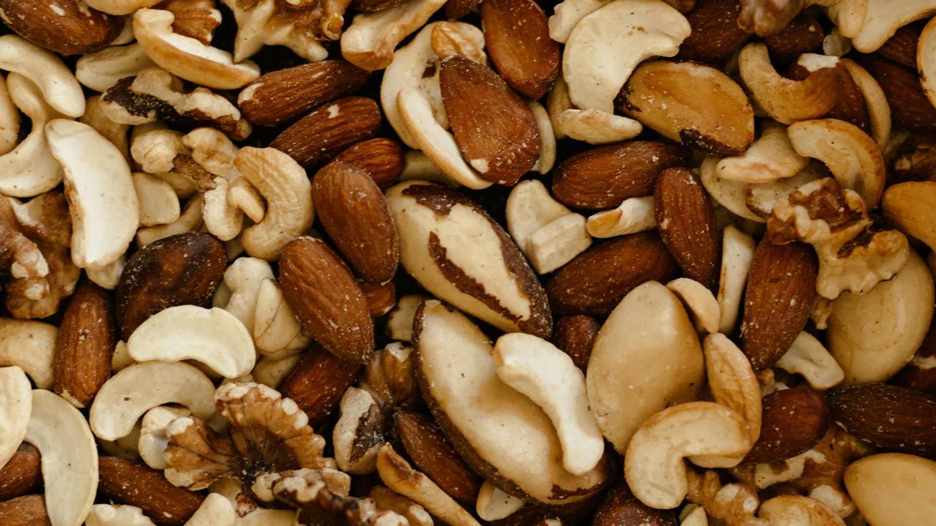 a mixture of nuts and nutshells in a bowl