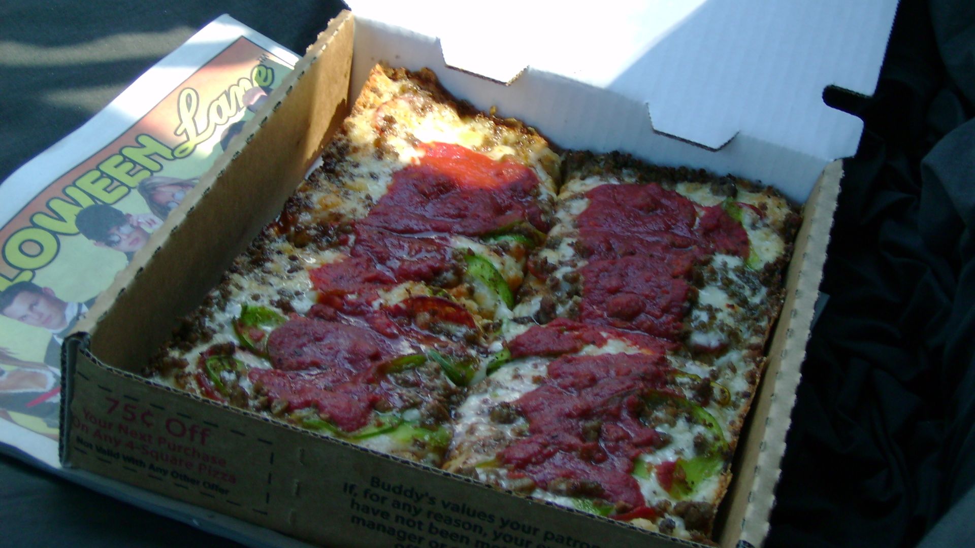 From Buddy's Pizza, original Conant Ave.(Hamtrack border) location in Detroit, Michigan USA. Pizza had pepperoni(baked under brick cheese), green peppers and hamburger. This was a small(4 slices), Large is 8 slices.