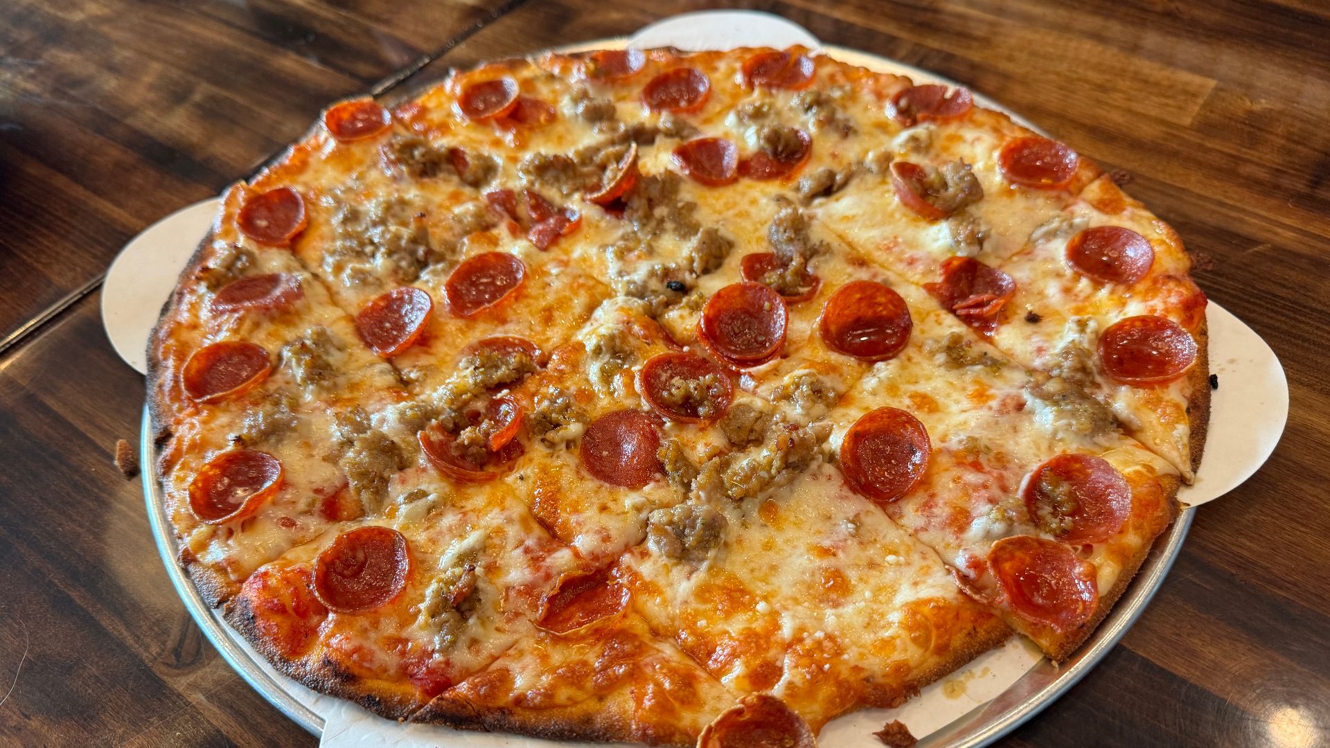 Sausage and pepperoni Chicago tavern style pizza at Croccante, Napa, California