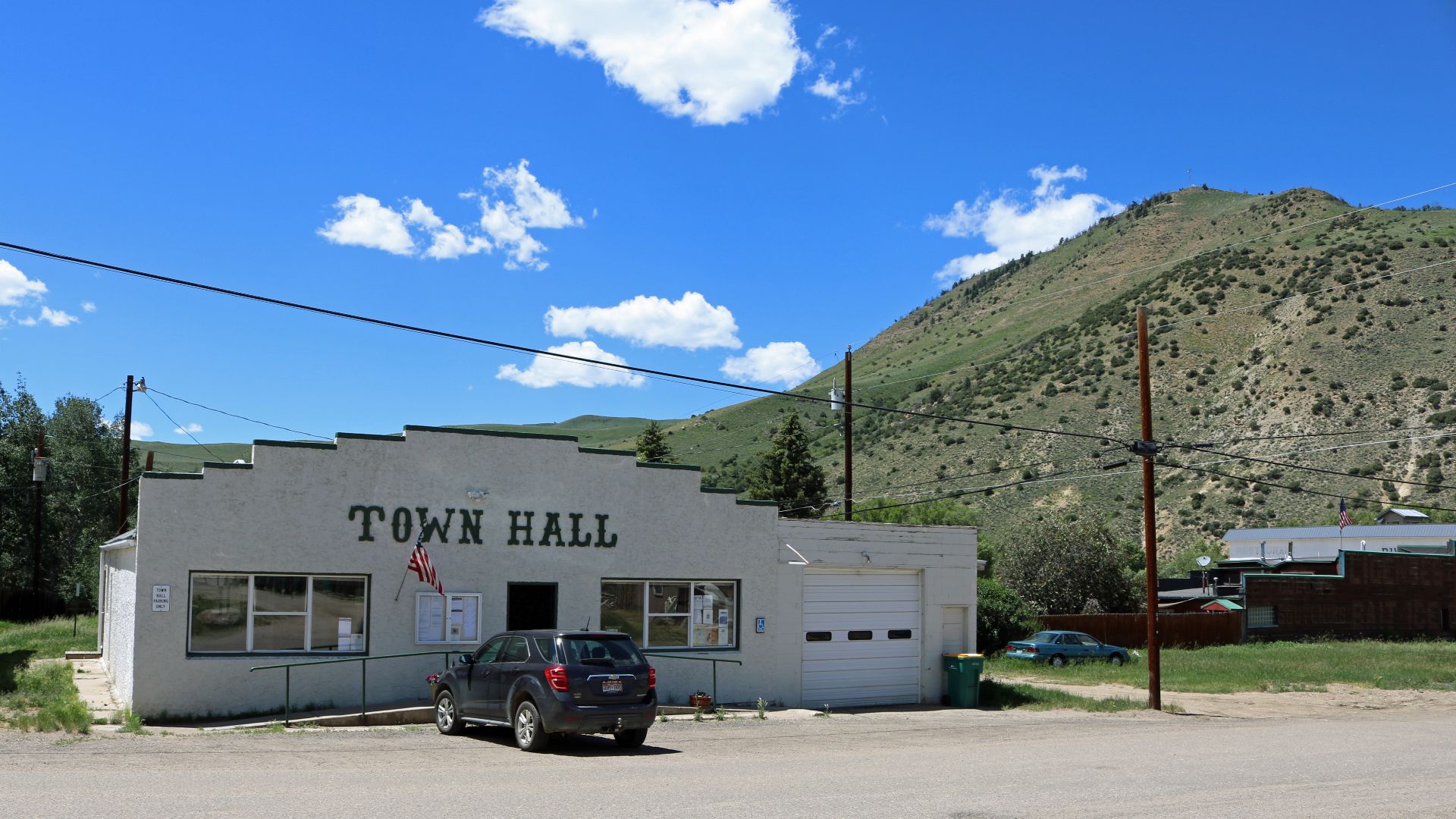 The town Hall for Hot Sulphur Springs, Colorado. It is located at 513 Aspen Street in Hot Sulphur Springs, Colorado. The mountain on the right is called Mount Bross. Its elevation is 9,252 feet (2,820 meters).