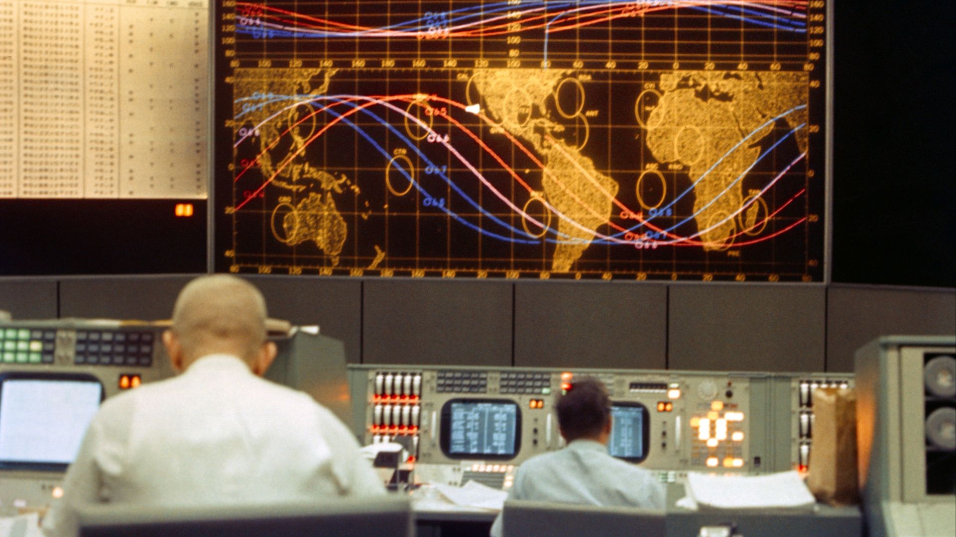View of the tracking screen at the front of the Mission Control Center during the Gemini-5 spaceflight. Image ID: S65-45083