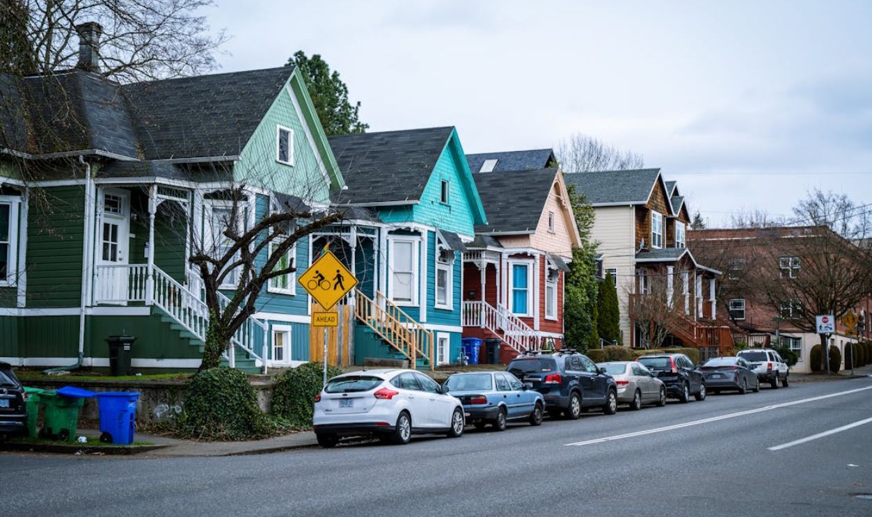 Picturesque street view of colorful, charming houses in a Portland, OR suburb, showcasing urban living