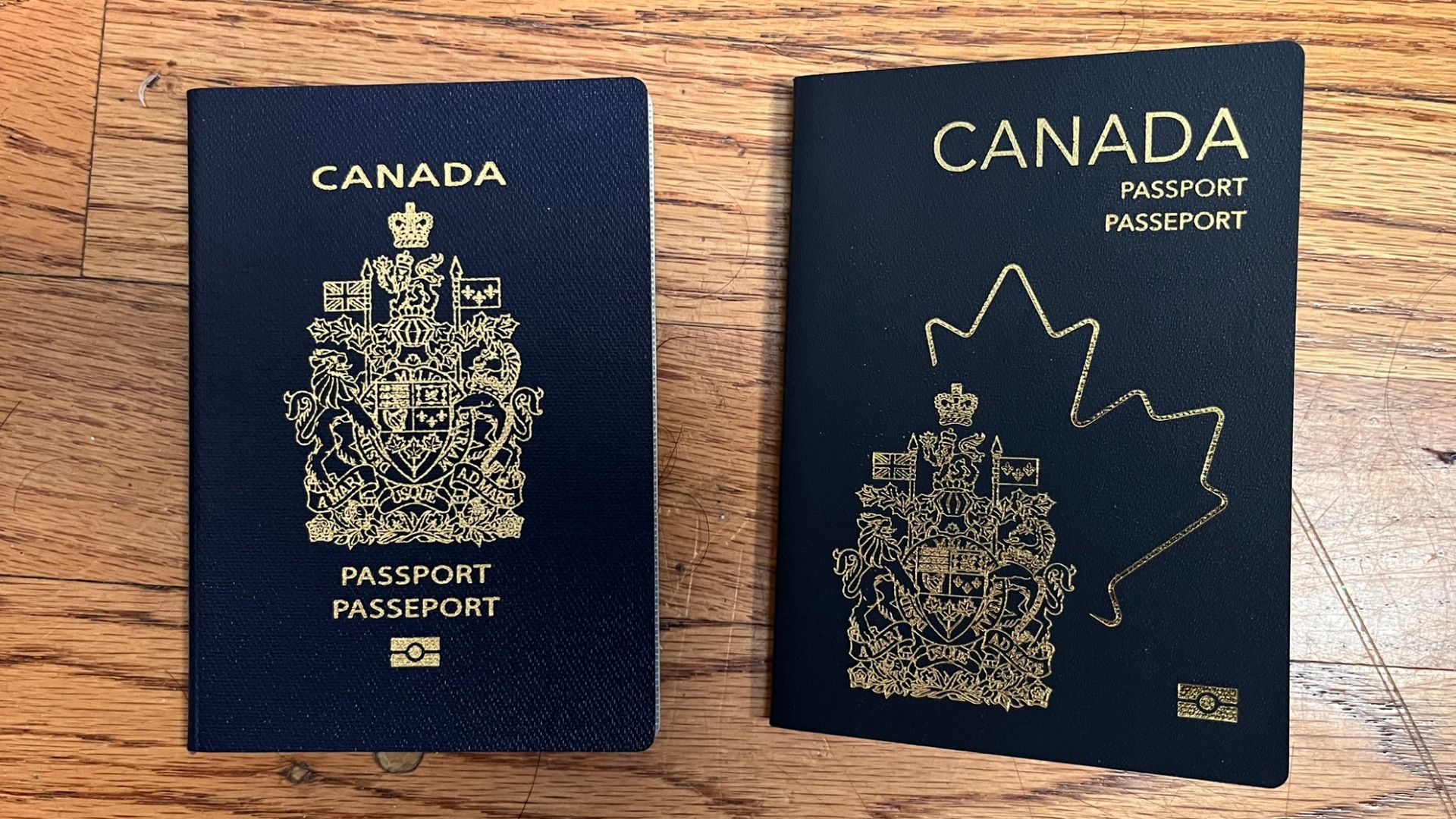 Canadian passports from old and new series.