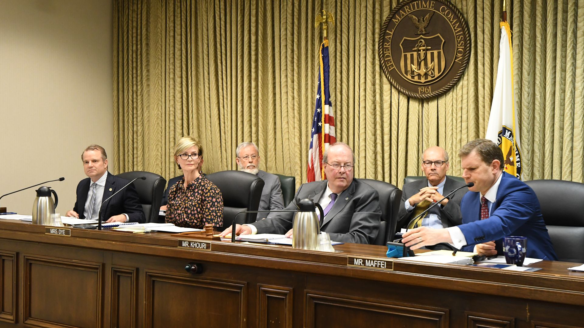 Commissioner Louis Sola, Commissioner Rebecca Dye, Chairman Michael Khouri, and Commissioner Daniel Maffei