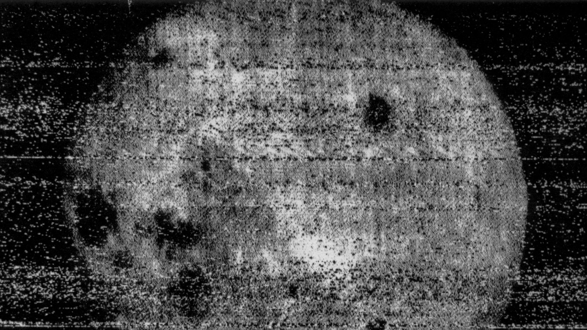Historic photo - the first full view of significant quality (cropped frame number 29)[1], of the first series of photos of the far side of the Moon, taken by Luna 3, October 7, 1959.
The dark patches at left include Mare Crisium (on the near side), Mare S