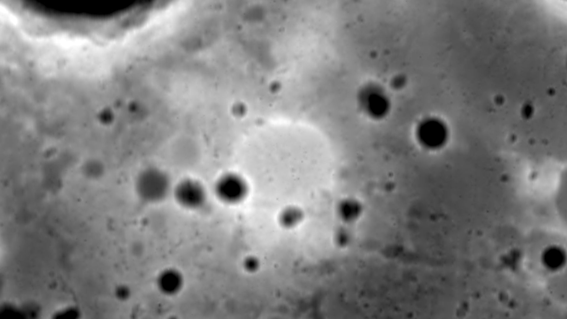 Mafic Mound in South Pole–Aitken basin on the Moon (look Moriarty et al., 2015; an open-access release). An elevation map, build from data by Lunar Orbiter Laser Altimeter (LOLA) aboard the Lunar Reconnaissance Orbiter. Lighter means higher; black is 6000
