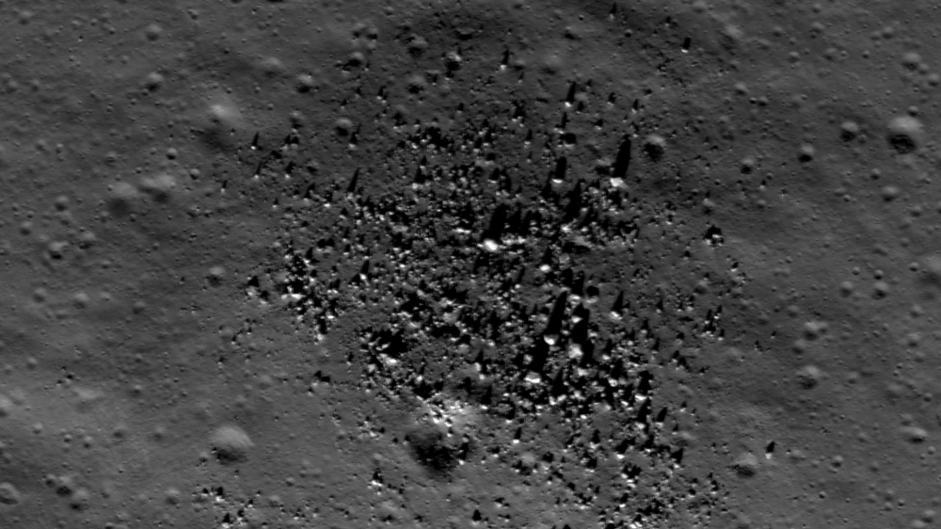 Small dome in the Compton-Belkovich region (61.33 °N, 99.68 °E). Evidence indicates a volcanic origin for this and other intriguing features in the region. Incidence angle is 64°, Sun is from the SSW, image is ~510 m across. NAC image number M139238146L [